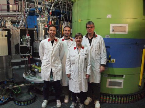 The scientists involved in front of the neutron three axes spectrometer PANDA at the Heinz Maier-Leibnitz Zentrum in Garching (from the left): Dr. Christian Franz (TUM), Dr. Petr Čermák (Charles University Prague, former Forschungszentrum Jülich), Dr. Astrid Schneidewind (Forschungszentrum Jülich) and Prof. Dr. Christian Pfleiderer (TUM).  © FRM II / TUM Team PANDA